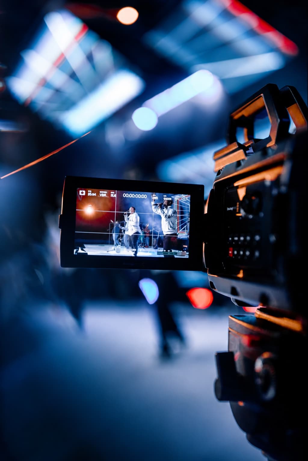 Professional video camera filming a live worship performance